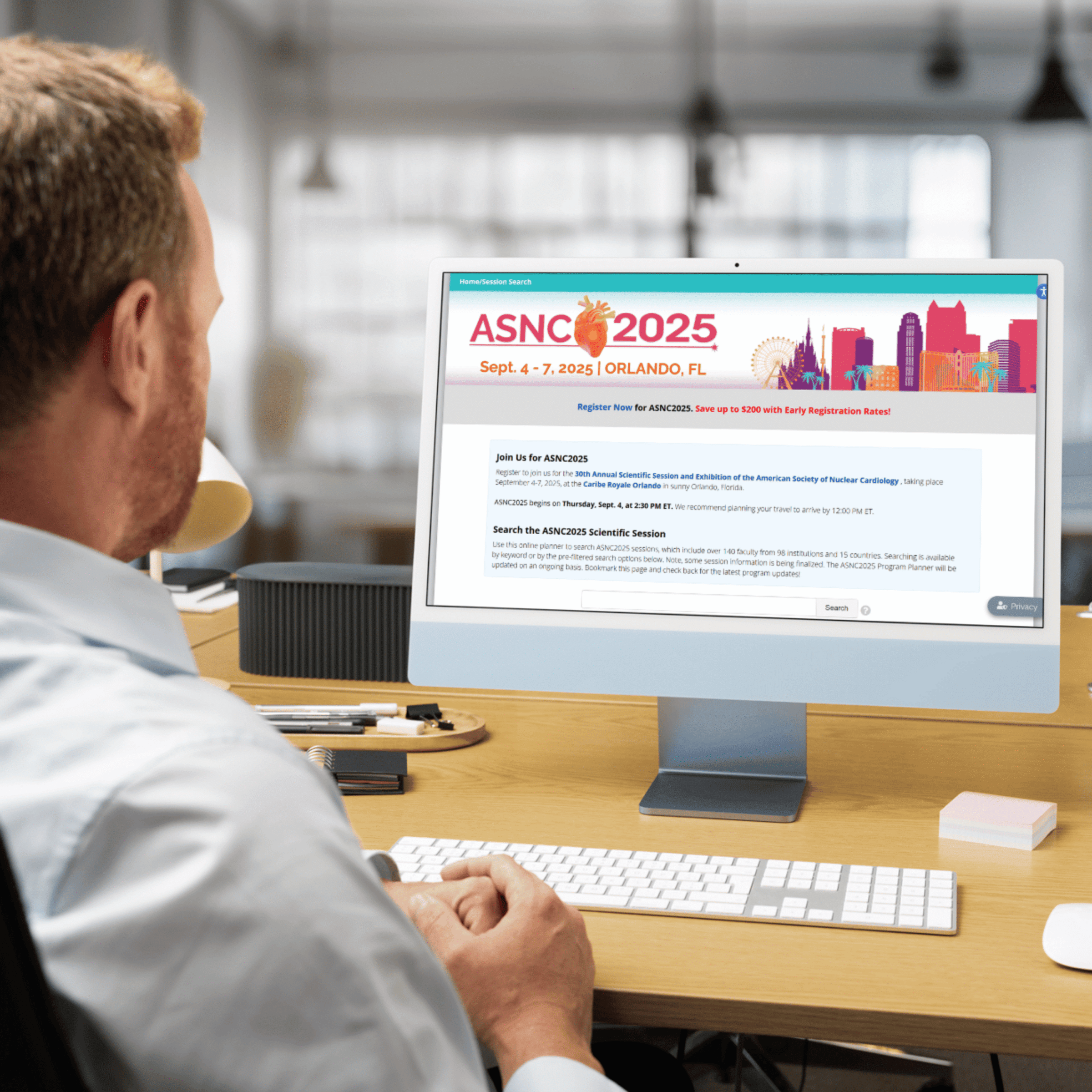 ASNC2025_man_in_front_of_computer